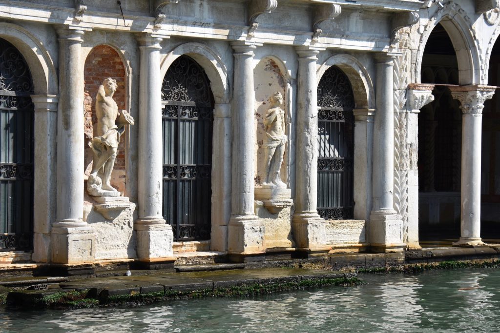 sculptures at front of Palazzo Grassi